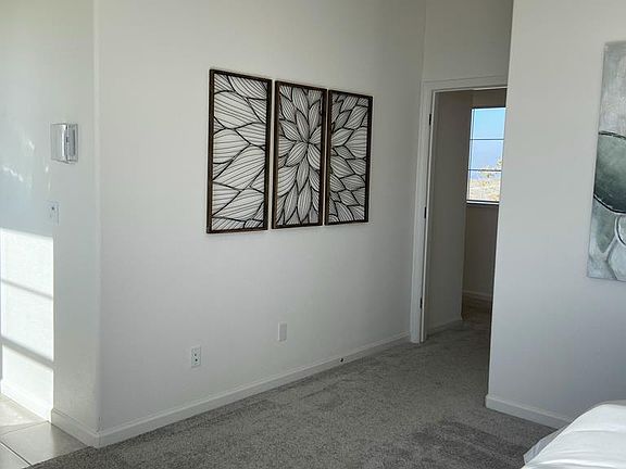 Photos with staging effect of the model home, this is an unfurnished home.