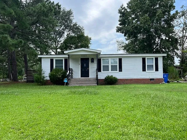 5005 Upland Game Rd NW — Photo 1