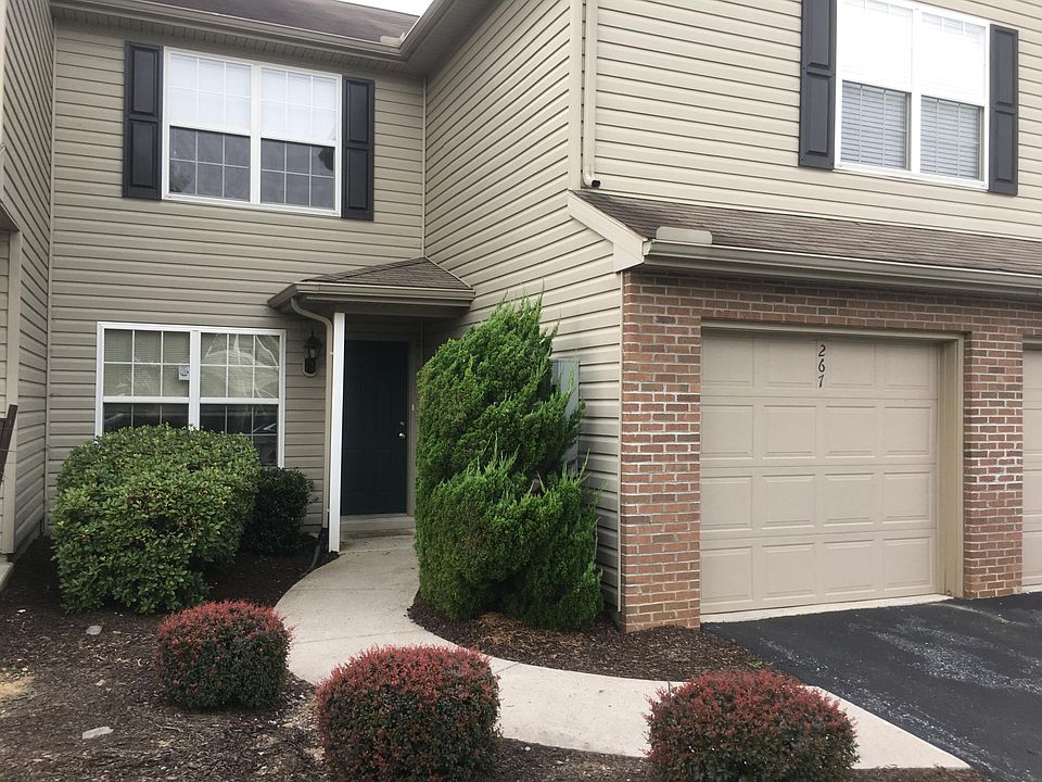 Garage and attractive landscaping