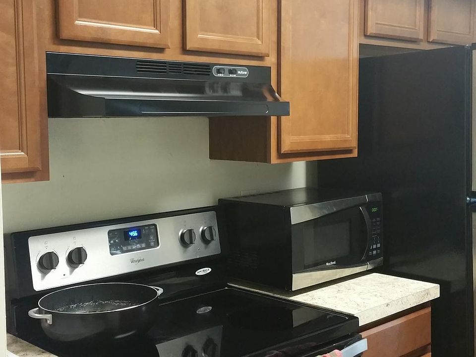 Stainless steel appliances and new cabinets