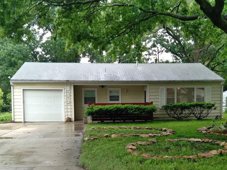 Add your porchswing to the covered front entrance hidden behind the patio fence and create your own quiet sitting area.