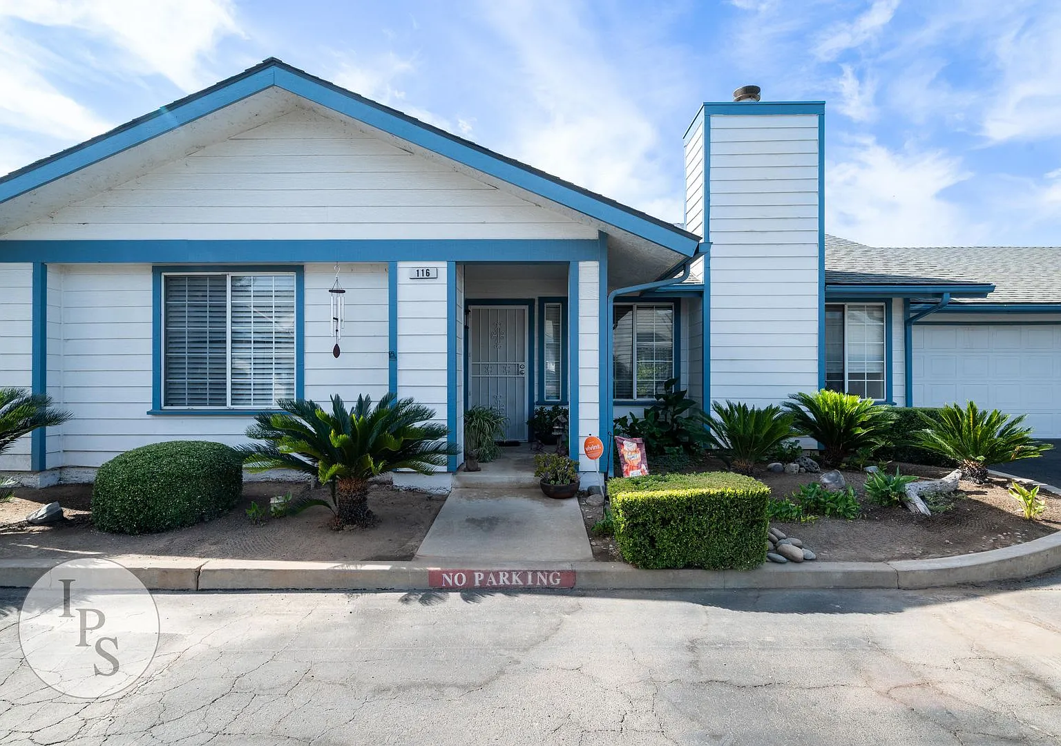 Charming Gated 2-Bed Condo with Attached 2-Car Garage & Water/Garbage Included in Prime Fresno Lo... — Photo 1