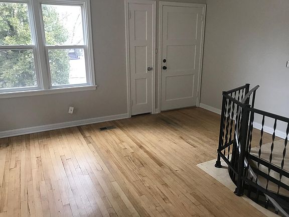 Living room, front door, sunny with four windows s/w facing,