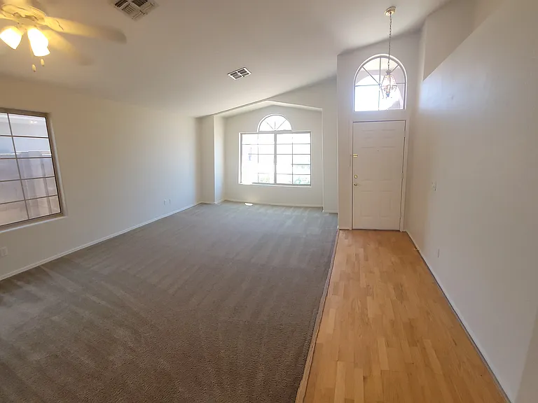 Front door entrance with family & dining room to the left of the picture.
