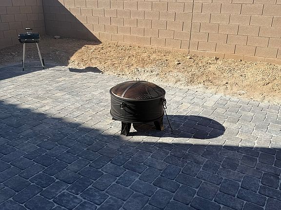 Paved Backyard 
NEW BBQ GRILL
NEW FIRE PIT