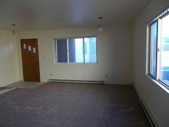 Looking the other direction in the main room. The door with 3 lights leads out to the rooftop deck.