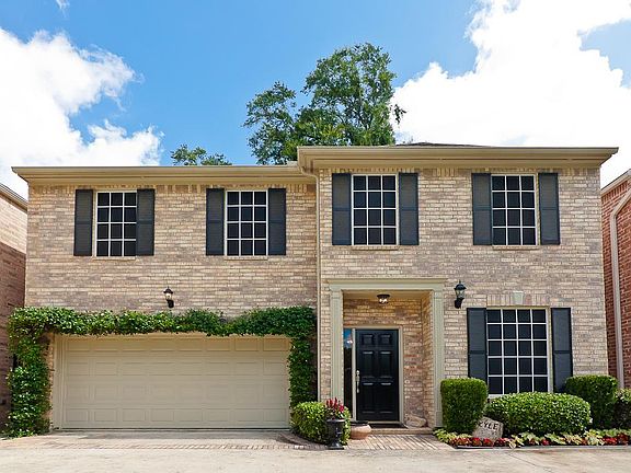 Gorgeous Brick Traditional Patio Home in small gated enclave.
