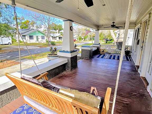 Large front porch for relaxation with fans for extra comfort