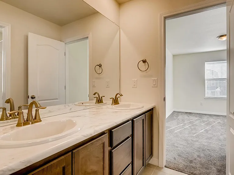 Tub and shower in every bathroom.