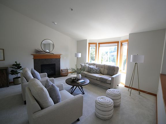 Living room with high ceilings and gas fireplace