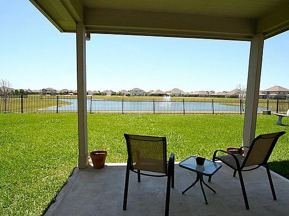 Beautiful view from covered porch area in backyard