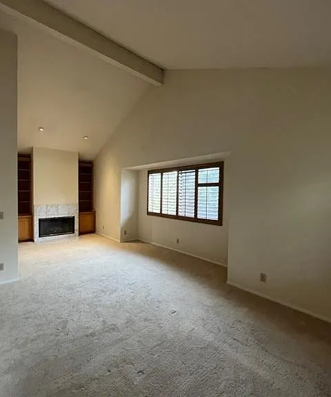 Master Bedroom sitting area with a fireplace