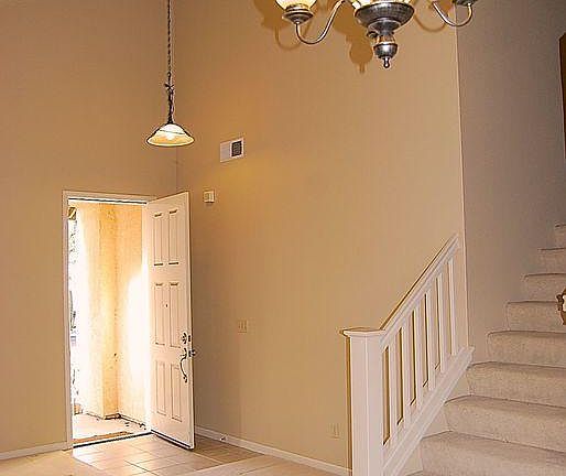 Open Living Room and Dining Room with High Ceilings