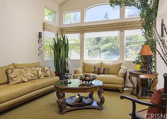 Formal Living Room with view to the private hills behind you