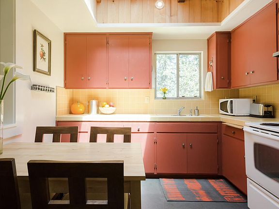 Kitchen with skylight and slate floors