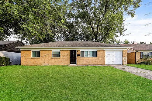 7233 E 34th Pl Photo 1