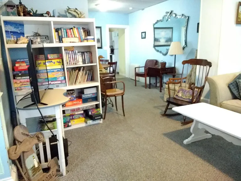 Spacious living room dining room. Doorway at end leads to kitchen.