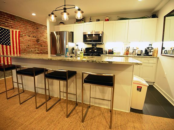 Great kitchen with plenty of counter space, a new gas stove, microwave and appliances - even an espresso machine.