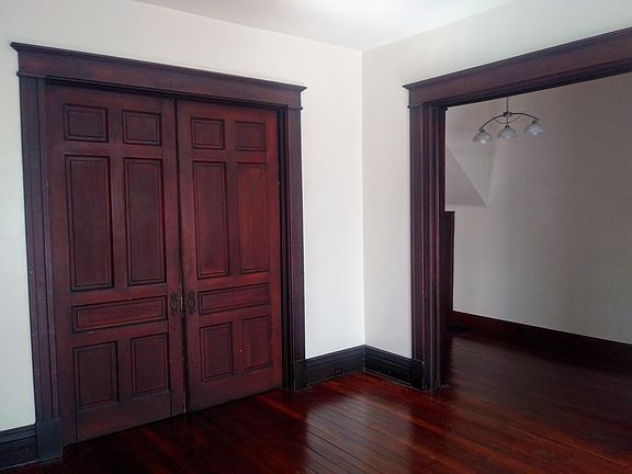 living room; historic pocket doors throughout