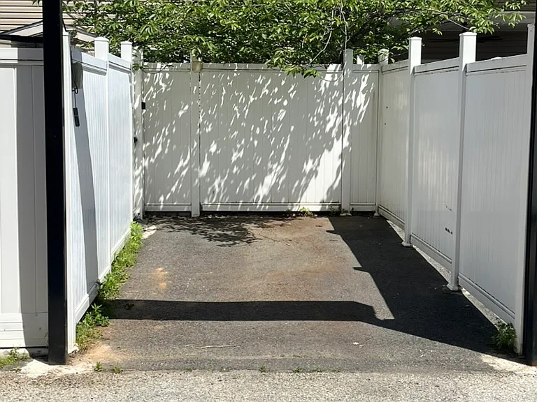 Parking space with garage door