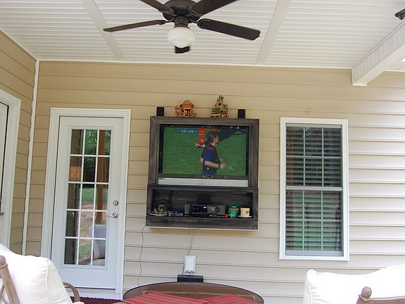 Covered Back Porch
						:
						Built in 42" Flat Screen TV included with house.
