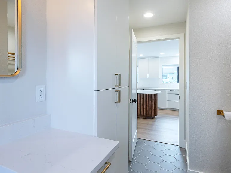 Main bath with abundant storage / cabinetry.