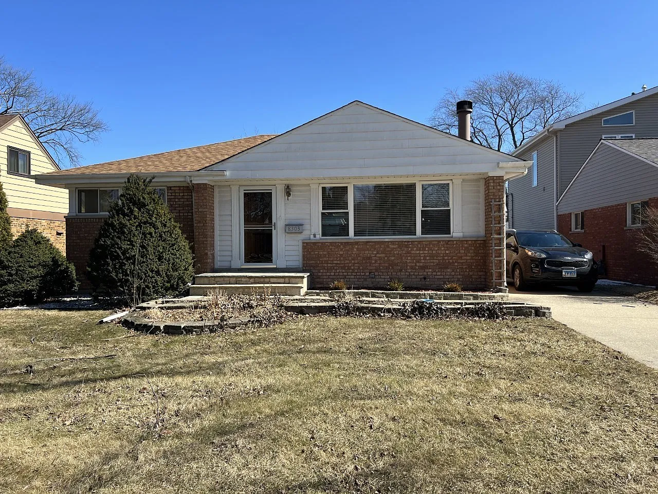 8303 N Ozanam Ave photo 1