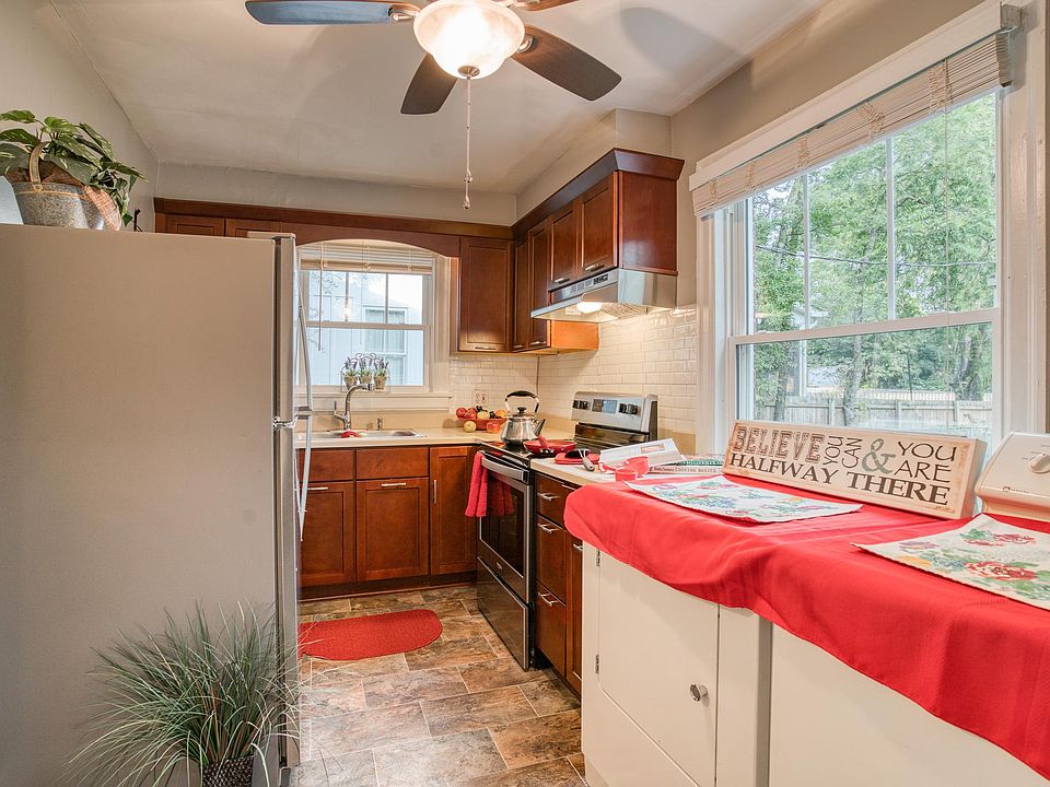 Kitchen with new stainless steel stove and refrig. In unit washer/dryer provided for additional fee.