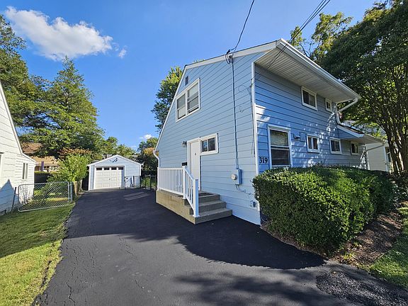 Long spacious driveway freshly sealed
