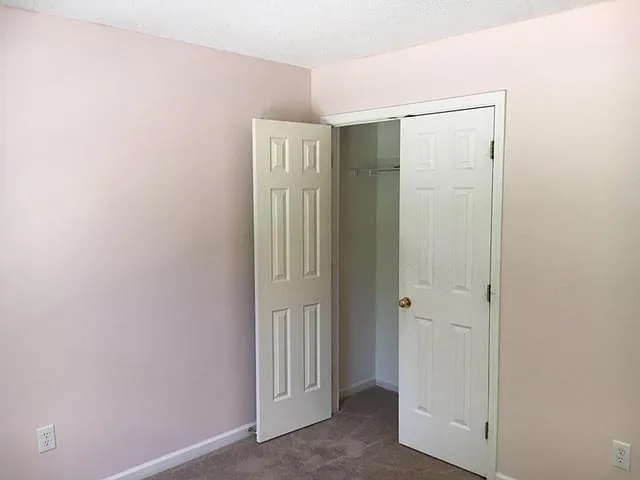Both secondary bedrooms have large, 2-door closets and wood laminate floors, a large double window with blinds and a curtain rod for your curtains.