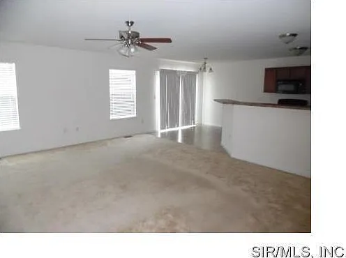 Family room with view of kitchen