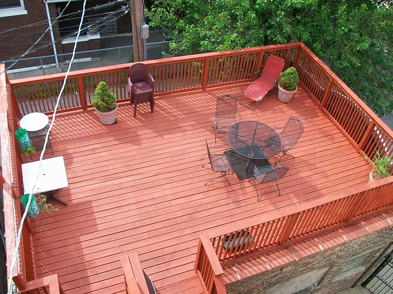 Large BBQ deck on roof of garage for your summer entertainment , also pleasant work space