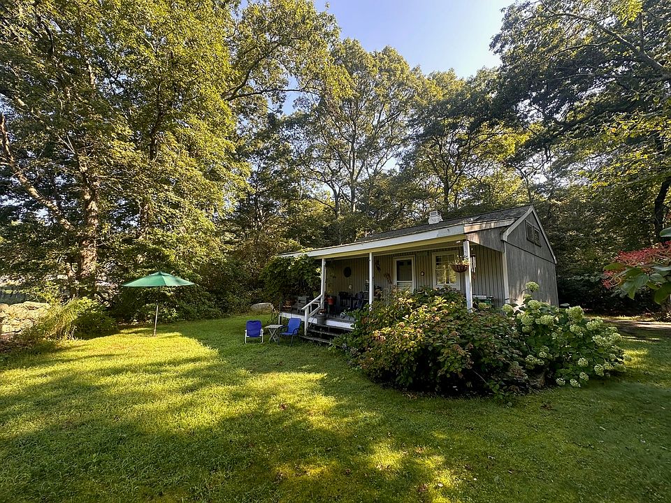 View of the back of the cottage and yard