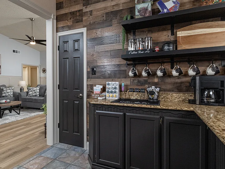Fully stocked kitchen with coffee bar and cooking essentials