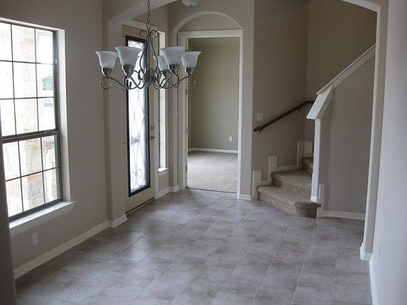 Entry foyer separates formal dining room from study