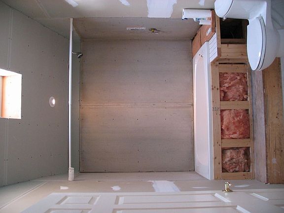 Bathroom w/raised whirlpool tub,cathedral ceiling & skylight