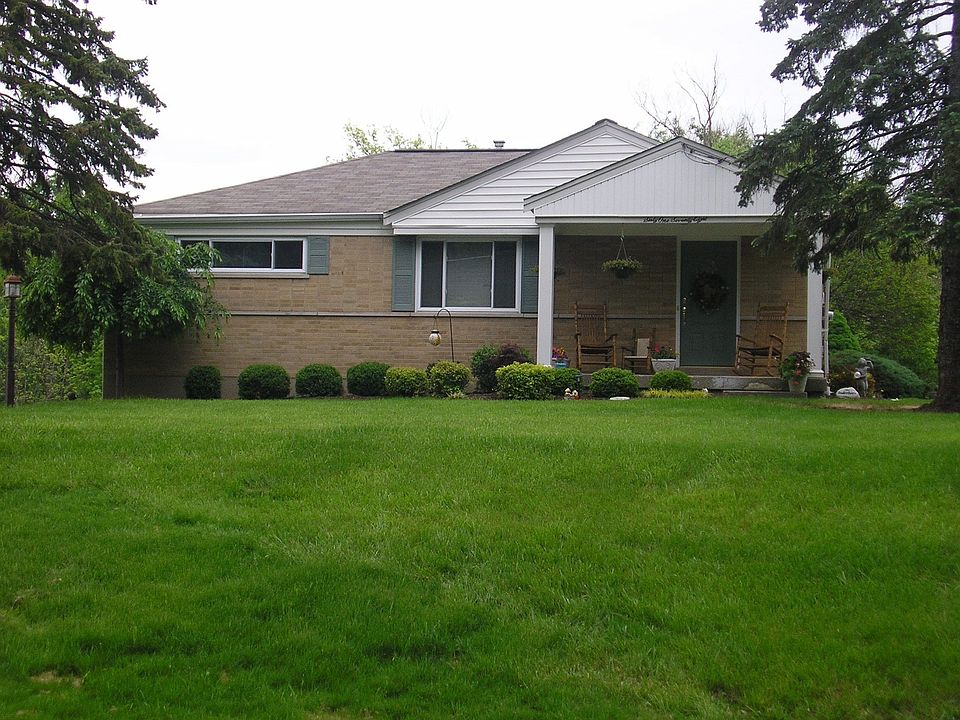 Solid brick ranch on quiet street. Welcoming landscaped yard, ready for you to