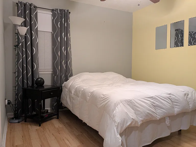 Master bedroom, furniture shown not provided.