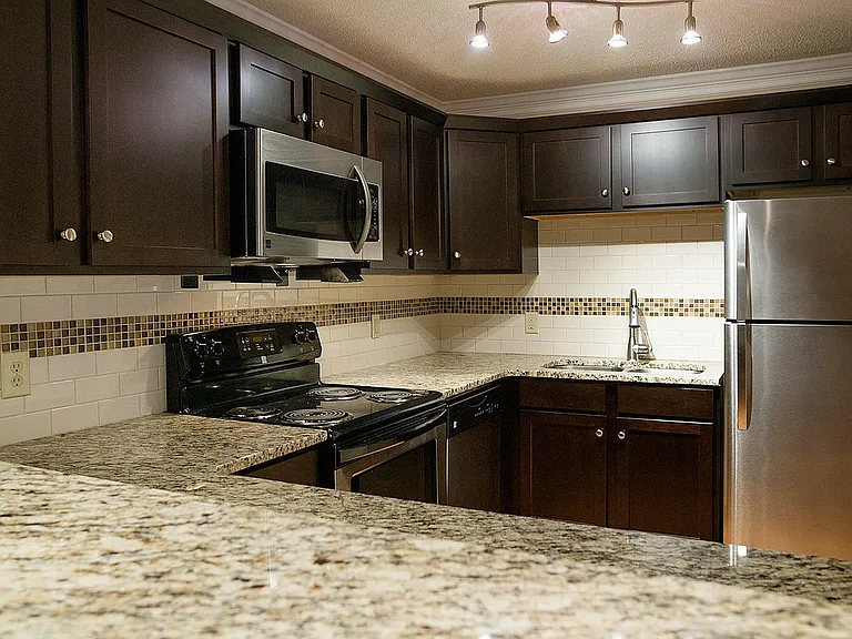 Explore this sleek kitchen, a perfect blend of style and functionality.