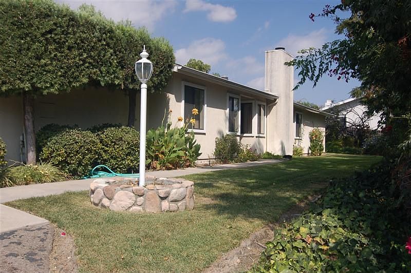 Lush, green walk to front door