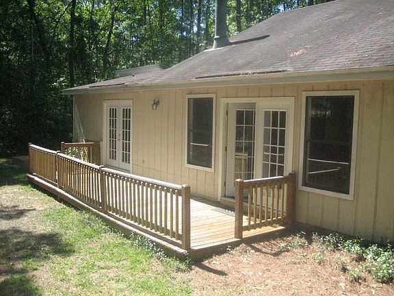 New French doors open to big back yard