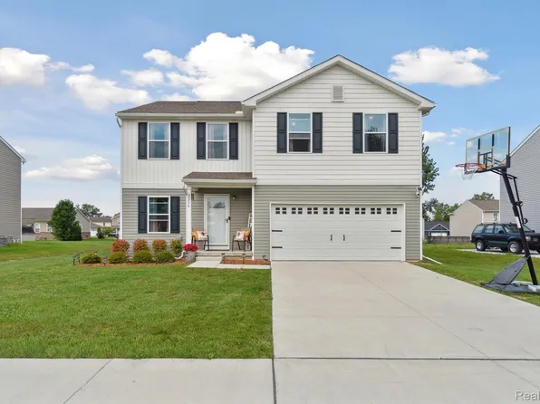 2216 Champion Dr, Burton, MI 48519