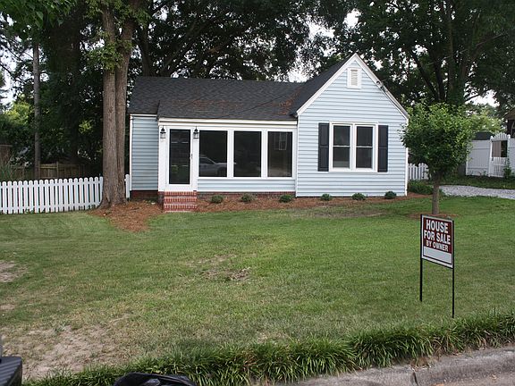 Front view of home and yard