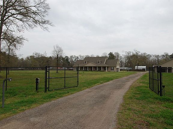  Electric gate, fully fenced acreage with intercom already in place,   Long drive way, plenty of space for all your needs.