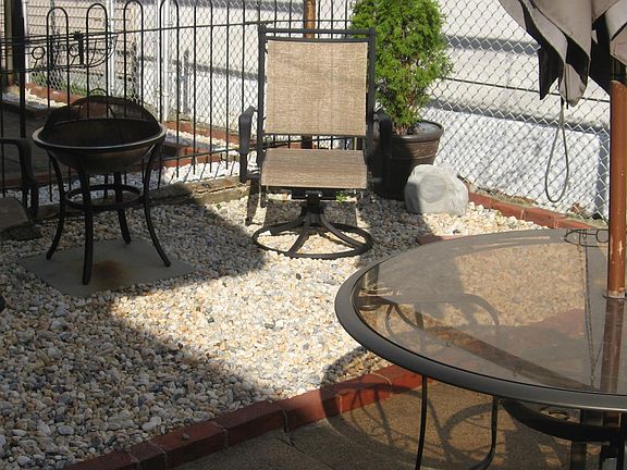 small fenced patio area -need updated picture of all concrete patio