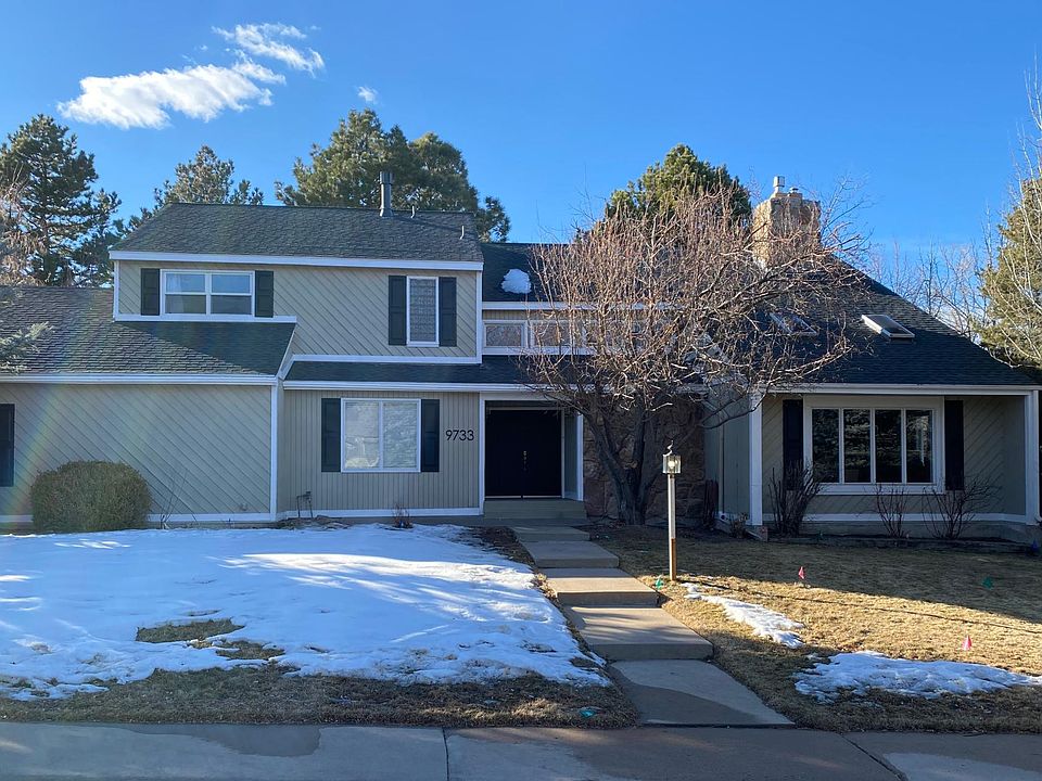 Large custom home with mature front and back yard landscaping. Two car side load garage on left side of house.