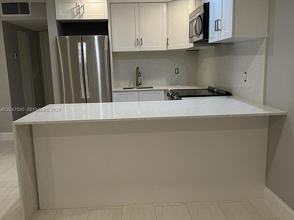 3rd image of 500 Village Green Cir W APT 215