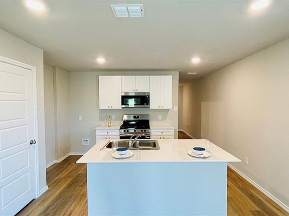 Kitchen - All Home and community information, including pricing, included features, terms, availability and amenities, are subject to change at any time without notice or obligation. All Drawings, pictures, photographs, video, square footages, floor plans, elevations, features, colors and sizes are approximate for illustration purposes only and will vary from the homes as built.