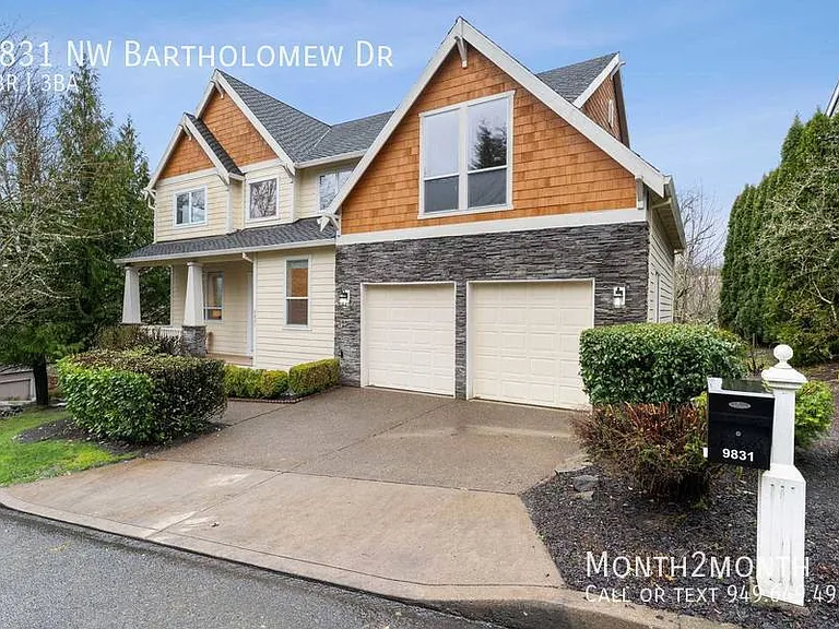 9831 NW Bartholomew Dr — Photo 34