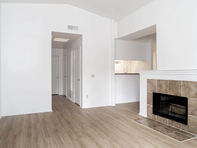 Living Room with Fireplace and Hard Surface Flooring